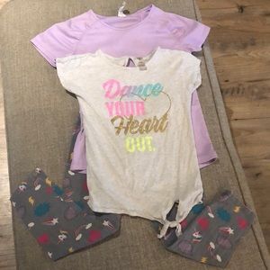 Two workout shirts and unicorn pants.